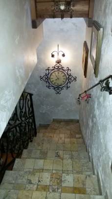 stair in scabas  travertine with square tiles and special mouldings.